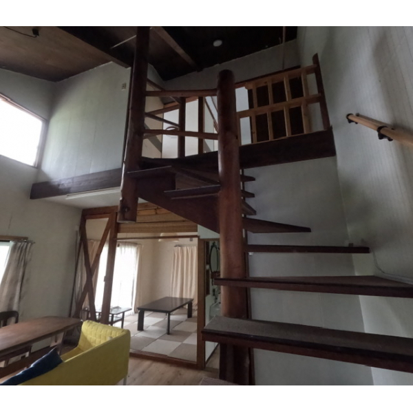 Wooden staircase leading to loft space